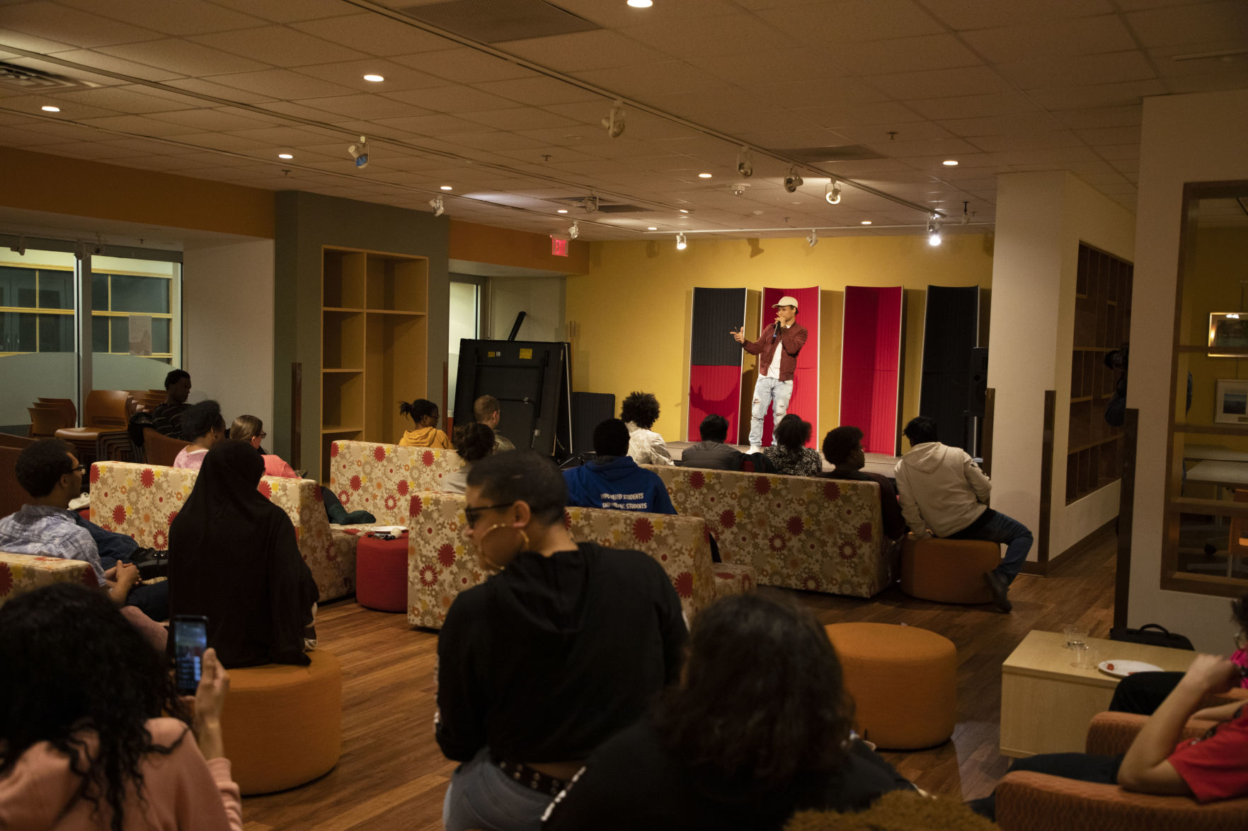 WMU junior, Tyrek Robinson, presents one of his poems to the audience.